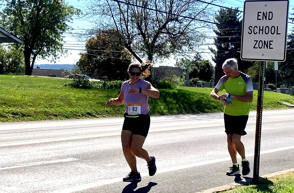 A man and a woman running together